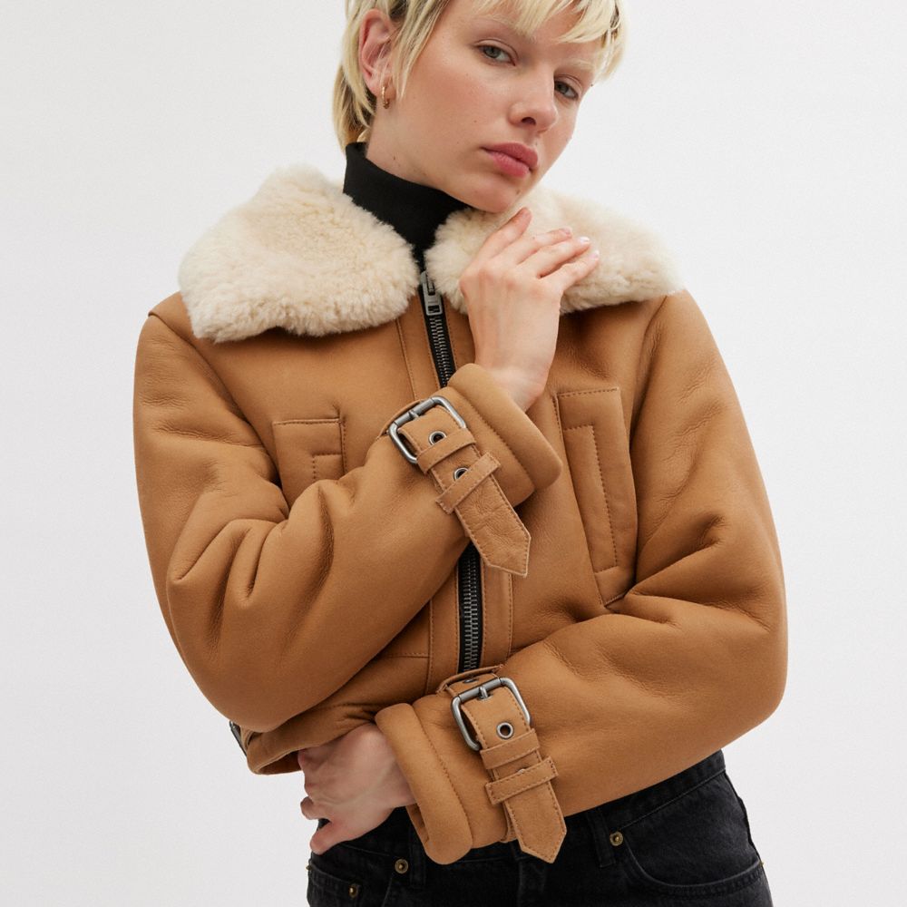 Női COACH® Cropped Shearling Aviator Kabát Barna Színes | HUBEW388